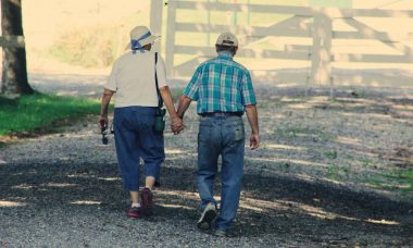 old-couple-walking-while-holding-hands-906111
